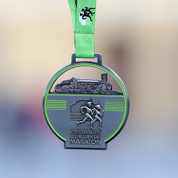 Organizator je letos zagotovil tudi medalje za udeležence teka na 10 kilometrov. | Foto: 