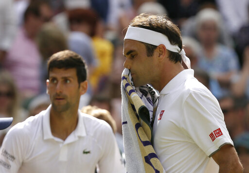 Roger Federer in Novak Đoković v Wimbledonu | Foto: Guliverimage/Vladimir Fedorenko
