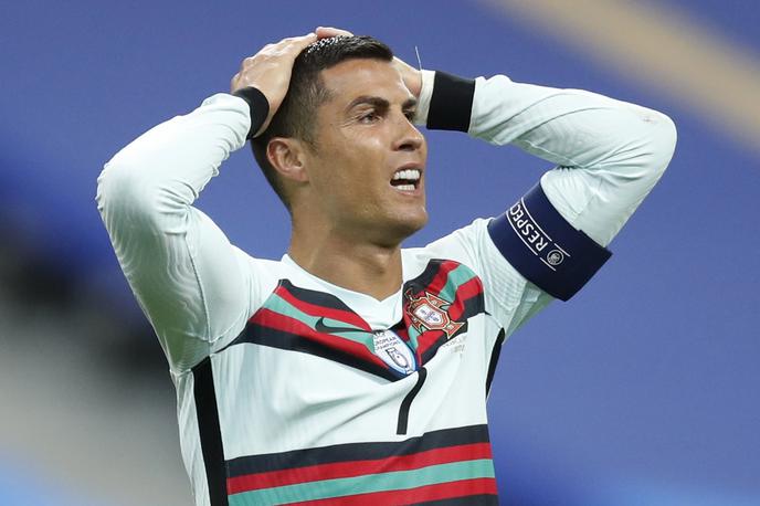 Cristiano Ronaldo | Cristiano Ronaldo bo zaradi koronavirusa izpustil sredino tekmo. | Foto Reuters