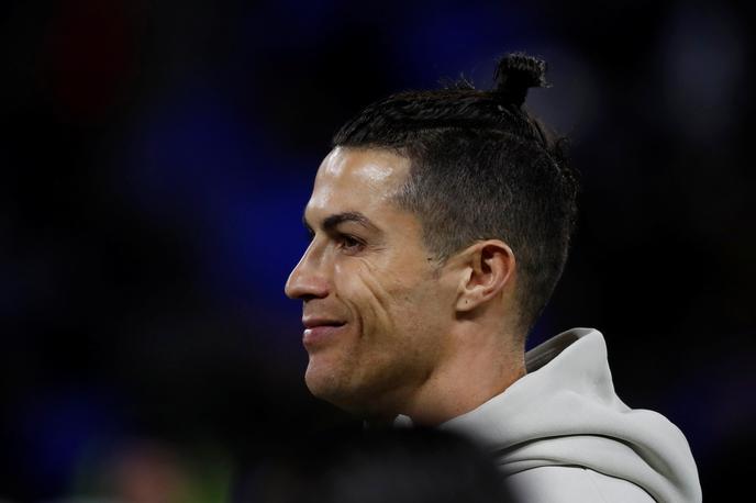 Cristiano Ronaldo | Cristiano Ronaldo je prvič po letu 2018 obiskal Santiago Bernabeu in takoj razburkal domišljijo navijačev Reala. | Foto Reuters