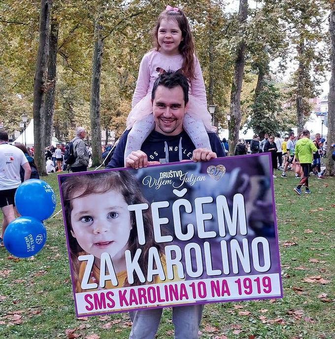 Karolina z očetom v cilju 27. Ljubljanskega maratona.  | Foto: FB/Življenje za Karolino