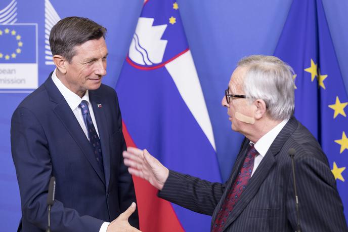 Borut Pahor in Jean-Claude Juncker | To ni bil klasičen, dolgočasen protokolarni obisk, je ocenil Pahor po srečanju s predsednikom Evropskega sveta Donaldom Tuskom, s katerim je sklenil dvodnevni obisk v Bruslju, ki po njegovih besedah dviguje ugled Slovenije. | Foto STA