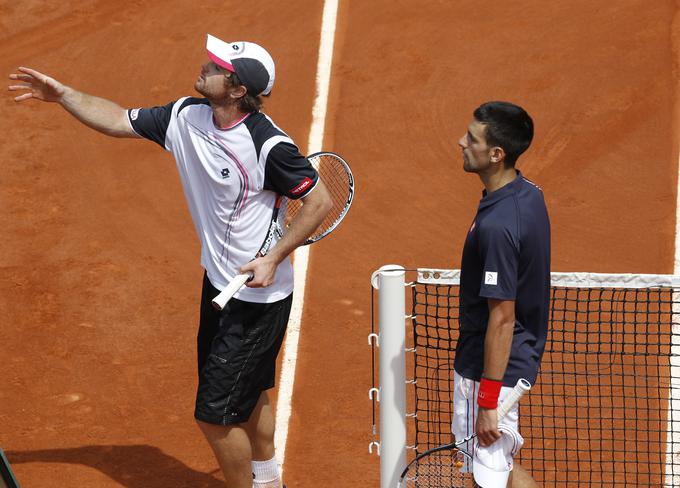 Blaž Kavčič in Novak Đoković sta leta 2012 igrala na OP Francije. | Foto: Reuters