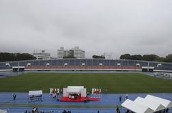 Pogrebno vzdušje ob prihodu olimpijske plamenice v Tokio