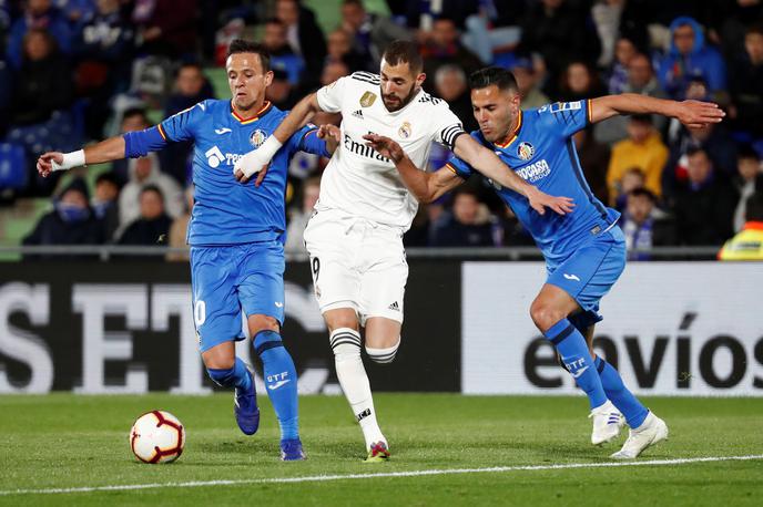Real Madrid Getafe | Getafe je ustavil v zadnjem času najbolj nevarnega galaktika, Karima Benzemaja. | Foto Reuters
