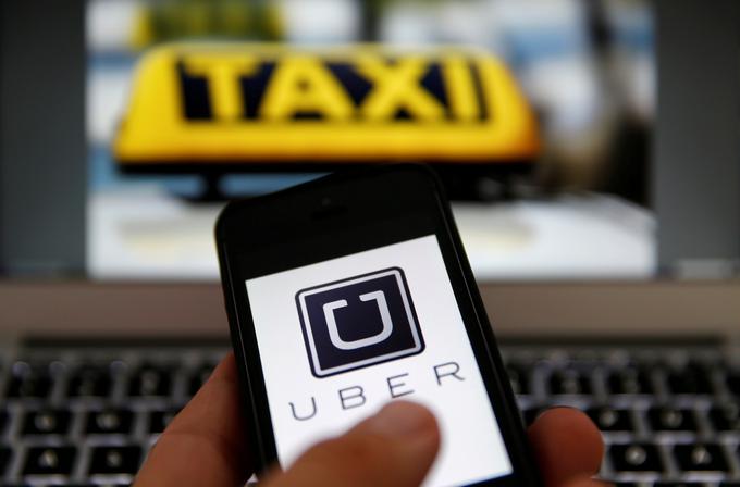 Vprašanje vseh vprašanj glede nesoglasij o Uberju: ali je Uber prevozniško podjetje, kot pravijo predvsem tradicionalni taksisti, ali digitalna platforma, kot so prepričani v Uberju? | Foto: Reuters