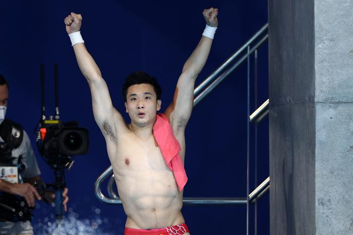 Yuan Cao | Yuan Cao je  prvi športnik, ki je osvojil zlato odličje v vseh treh kategorijah v skokih v vodo.  | Foto Reuters