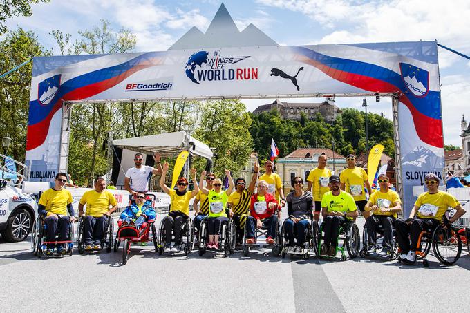Tudi na slovenski trasi je vse več tekmovalcev in podpornikov na invalidskih vozičkih. | Foto: Grega Valančič/Sportida