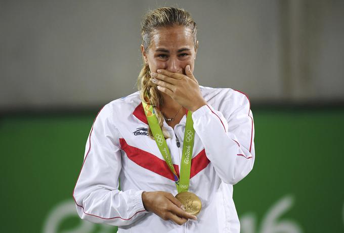 Puigova je v prvem krogu izločila edino slovensko tenisačico na teh OI Polono Hercog. | Foto: Reuters