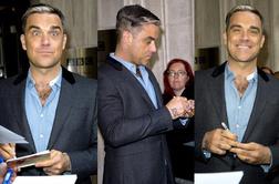 Robbie Williams kot George Clooney