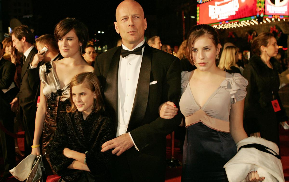 Bruce Willis hčerke | Bruce Willis leta 2004 s hčerkami Rumer, Tallulah in Scout, ki so se mu rodile v zakonu z Demi Moore. | Foto Guliverimage