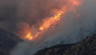 V Italiji in Avstriji požari, drugod tudi neurja