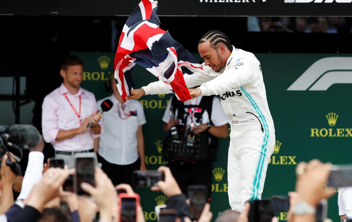 Lewis Hamilton Silverstone | Lewis Hamilton slavi rekordno šesto zmago na domači dirki v Silverstonu. | Foto Reuters