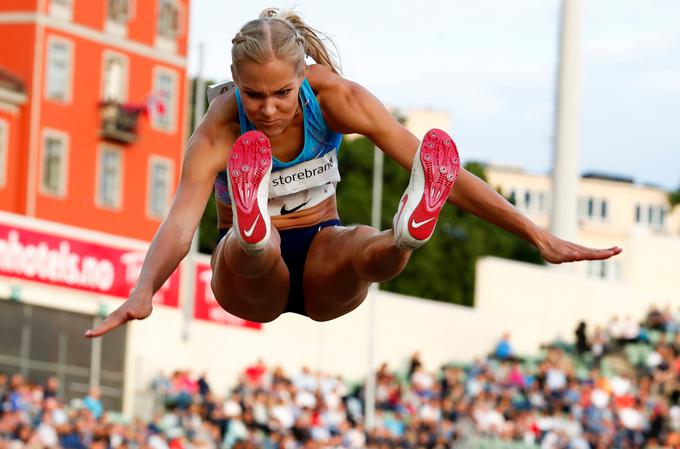 Darja Klišina je bila druga v skoku v daljino, premagala jo je Američanka Tianna Bartoletta (679 cm). | Foto: Reuters