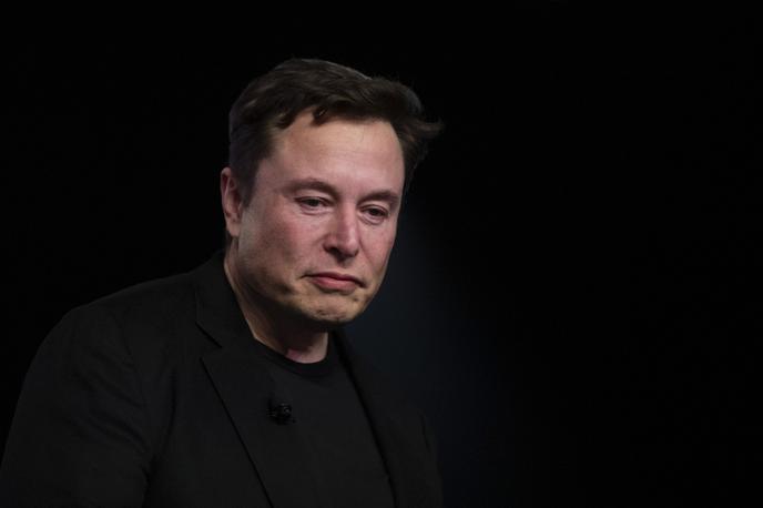 Elon Musk, Tesla | Ameriški analitiki menijo, da Elon Musk le išče način, kako pobegniti od napovedanega posla, ki naj bi bil zanj neugoden.  | Foto Guliver Image