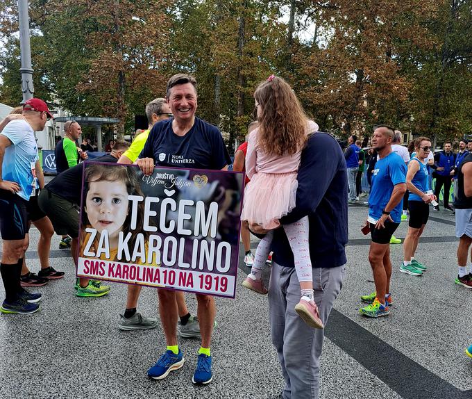 Borut Pahor je tokrat tekel za deklico Karolino. | Foto: Alenka Teran Košir