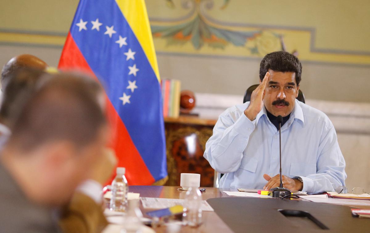 Nicolas Maduro Venezuela | Ministrstvo za zunanje zadeve je že večkrat ugotovilo, da je v Venezueli, ki ji vlada Nicolas Maduro (na fotografiji), huda gospodarska in politična kriza, kar je zakonski pogoj za repatriacijo. | Foto Reuters