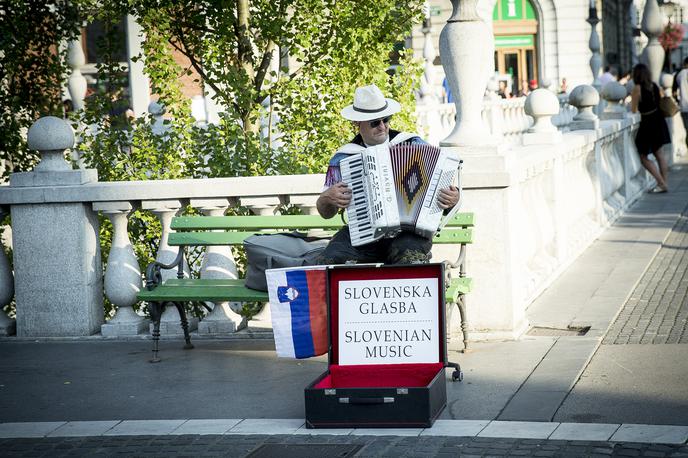 ulični glasbeniki, harmonikar | Harmonikar s Prešernovega trga ni najbolj priljubljen. | Foto Ana Kovač