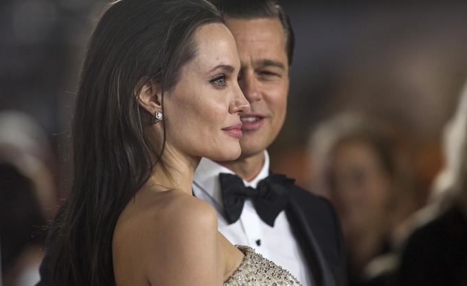 Igralci se na snemanju pogosto zaljubijo. Še posebej, če je njihova soigralka Angelina Jolie. | Foto: Reuters