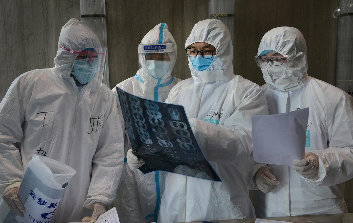 Koronavirus zdravniki Kitajska | Foto Reuters
