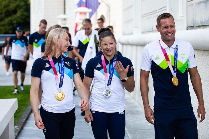 Z olimpijskima prvakoma iz Tokia Janjo Garnbret in Benjaminom Savškom | Foto: Grega Valančič/Sportida