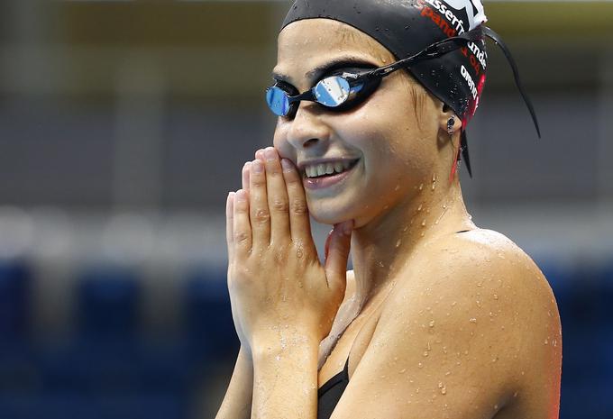 Yusra je srečna, ker v Berlinu spet lahko normalno plava, ne pa da njen bazen bombardirajo. | Foto: Reuters