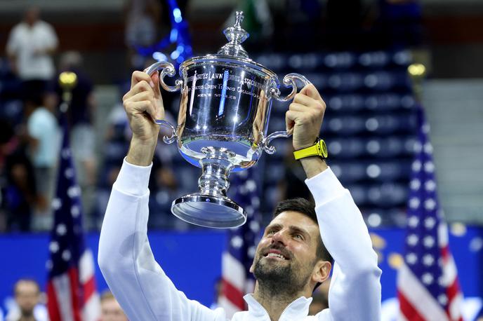 Novak Đoković finale OP ZDA | Novak Đoković je v nedeljo četrtič osvojil grand slam v New Yorku. | Foto Reuters