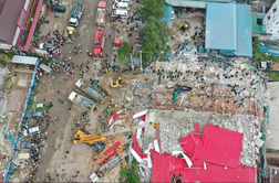 Število smrtnih žrtev po zrušenju stavbe v Kambodži raste