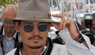 Johnny Depp radodaren do sina Sandre Bullock