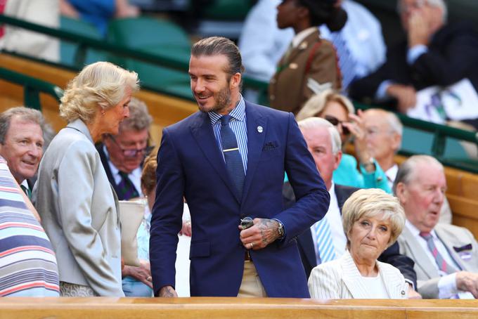David Beckham tudi na Wimbledonu odlično upošteva modno pravilo. | Foto: Getty Images
