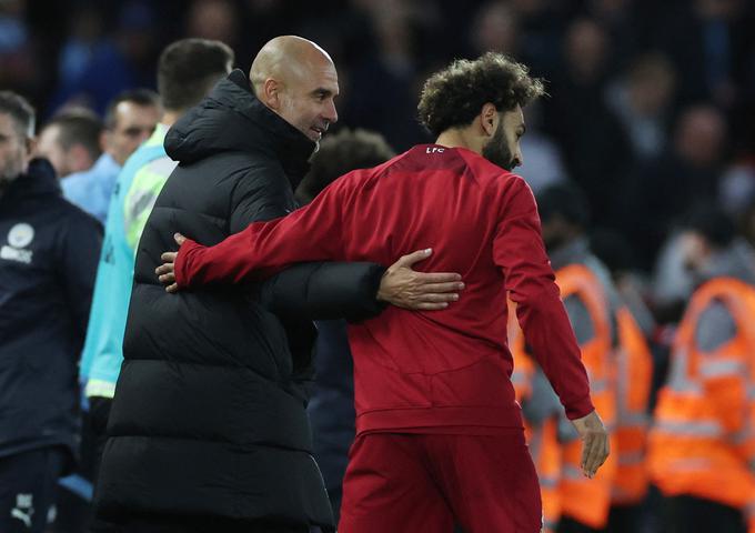 Pep Guardiola in Mohamed Salah po tekmi | Foto: Reuters