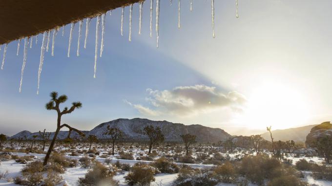 Vreme, sonce, sneg, ledene sveče | Foto: Reuters