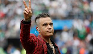 Robbie Williams je bil tarča morilca, vendar so ga rešili njegovi prijatelji