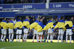 V Liverpoolu podpora Ukrajini in zmaga Cityja, čustvena vrnitev Eriksena