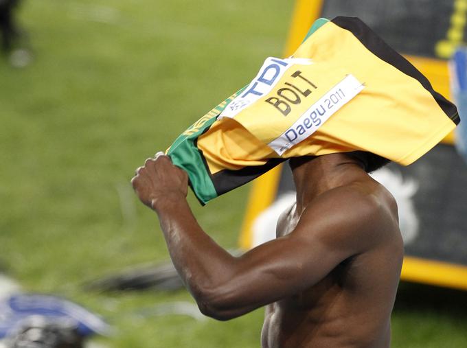 Edini primer, da je moral Usain Bolt zaradi prehitrega štarta na velikem tekmovanju zapustiti stezo. | Foto: Reuters