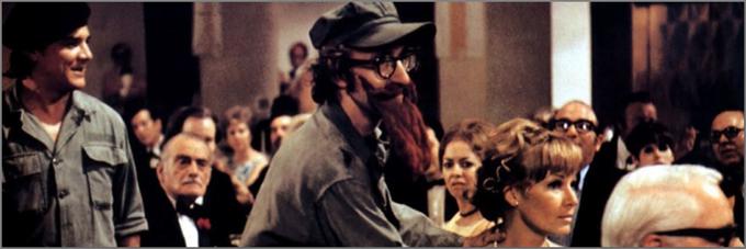 Woody Allen pokaže ves svoj bizarni humor v tej zgodbi o preizkuševalcu "čudaških naprav", ki ga pusti dekle (Louisse Lasser), preden postane predsednik majhne države, polne absurdnih pripetljajev. • V petek, 8. 2., ob 13.20.

 | Foto: 