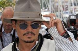 Johnny Depp radodaren do sina Sandre Bullock