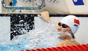 Z olimpijskim rekordom Jiao do zlata