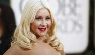 Aguilera: Razlog za ločitev je bila nezvestoba