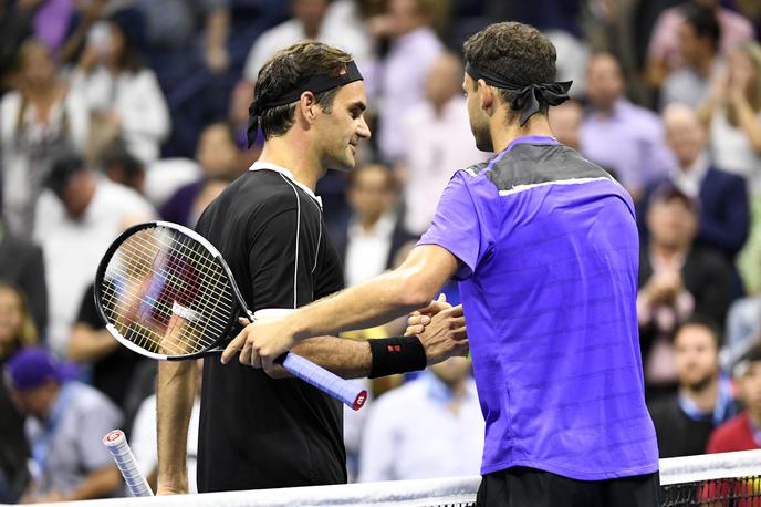 Riger Federer Grigor Dimitrov | Grigor Dimitrov je po velikem preobratu izločil Rogerja Federerja in se prvič v karieri prebil med najboljše štiri v New Yorku. | Foto Reuters