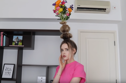 Pojavil se je nov trend: cvetlične vaze kar na glavi #video