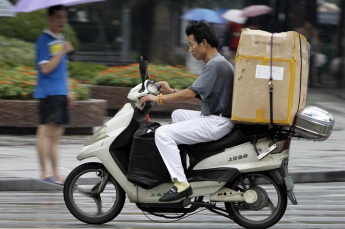 Raznašalec paketov | Foto Reuters