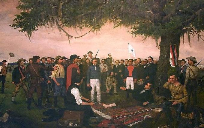 Američani so se v Teksas začeli priseljevati leta 1820, ko je bila Mehika še del španskega imperija. V nekaj letih so postali Američani večina v Teksasu in se leta 1835 uprli mehiški oblasti. Teksas je z zmago nad mehiško vojsko, ki jo je vodil general Santa Anna, dejansko postal neodvisen, čeprav je Mehika Teksas še vedno štela za del svoje države. Mehiška vojska se je po porazu leta 1836 umaknila južno od reke Rio Grande. | Foto: commons.wikimedia.org