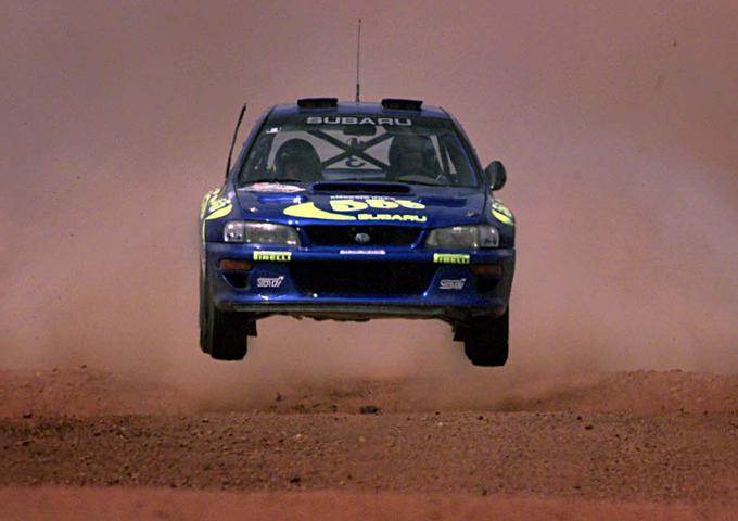 Nepozabna subaru impreza WRC, za volanom pa nekdanji svetovni prvak Colin McRae. | Foto: Reuters
