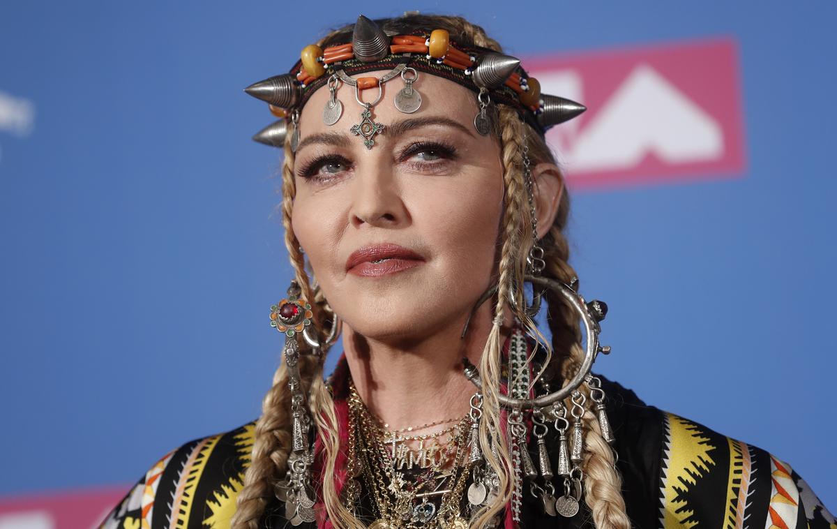 Madonna | Madonna je s svojim sebičnim poklonom Arethi Franklin razočarala marsikaterega televizijskega gledalca. | Foto Reuters