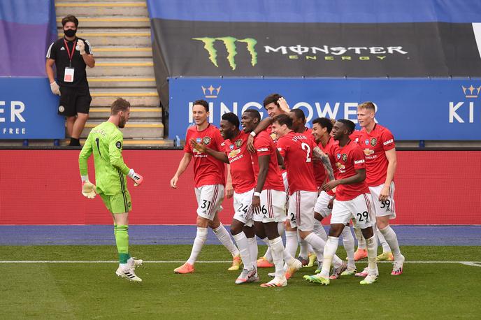 Manchester United | Veselje nogometašev Manchester Uniteda, ki so si z zmago v zadnjem krogu zagotovili ligo prvakov. | Foto Reuters