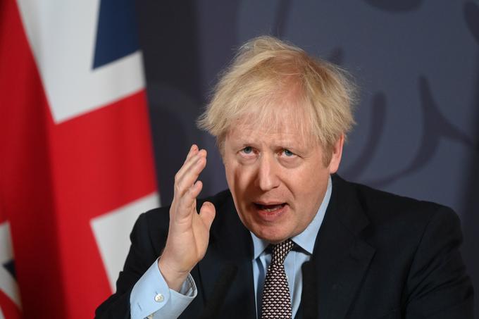 Britanski premier Boris Johnson je po današnji sklenitvi dogovora o prihodnjih odnosih z EU dejal, da je Združeno kraljestvo sklenilo največji trgovinski sporazum do zdaj. | Foto: Reuters