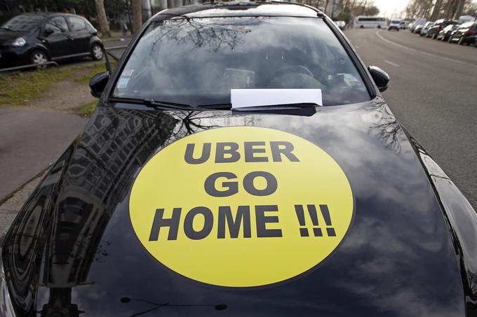 Uber je s svojim poslovnim modelom razveselil marsikaterega uporabnika, a tudi razjezil mnoge, ki glasno izražajo svoje nasprotovanje. | Foto: Reuters