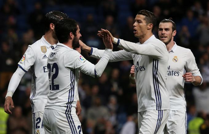 Cristiano Ronaldo je z dvema goloma v zadnjih petih minutah rešil Real. | Foto: Reuters