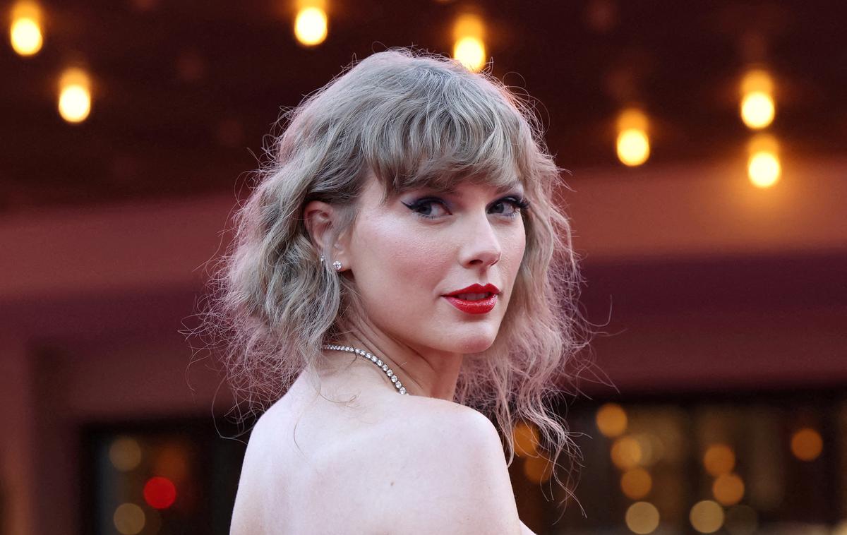 Taylor Swift | Swiftova je za revijo povedala, da je ob prejetju naziva najbolj ponosna in najsrečnejša.  | Foto Reuters